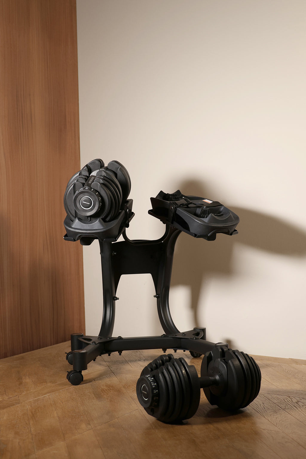 Lifestyle image of Northern Stealth Adjustable Dumbbell Set 24kg with Stealth Rack
