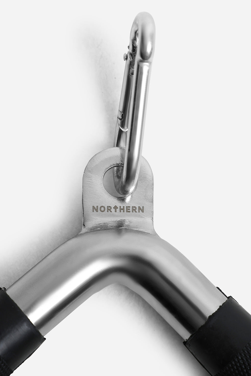 Detail shot of reinforced cable attachment point and compact V-shaped handle design