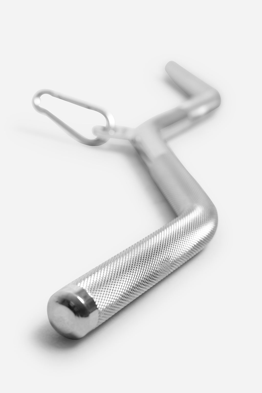 Angled view of lat pulldown cable attachment with textured grip zones and multi-angle handle positions