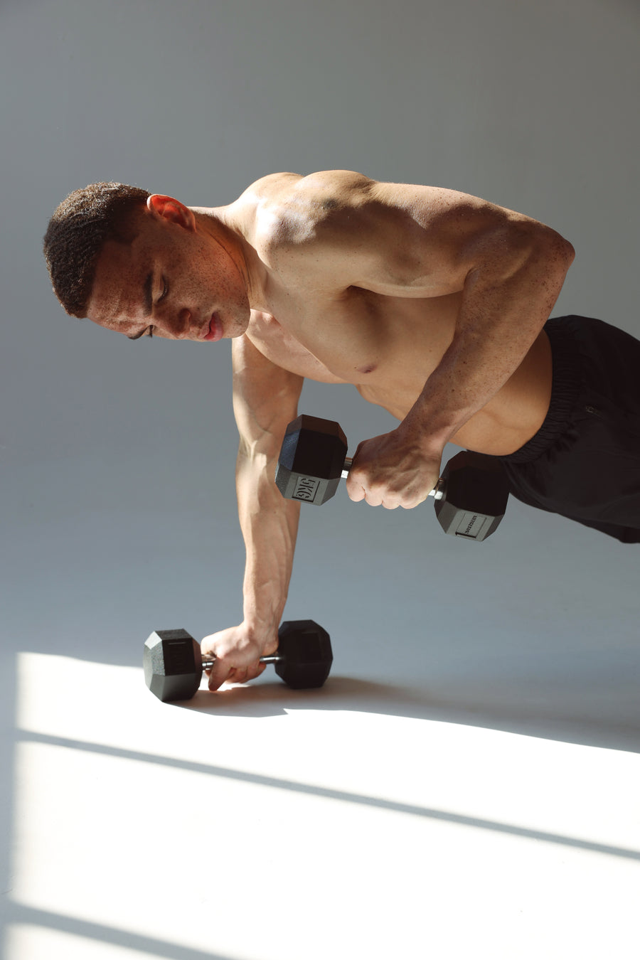 Hex Dumbbell Set Use in Home Gym Floor Workout