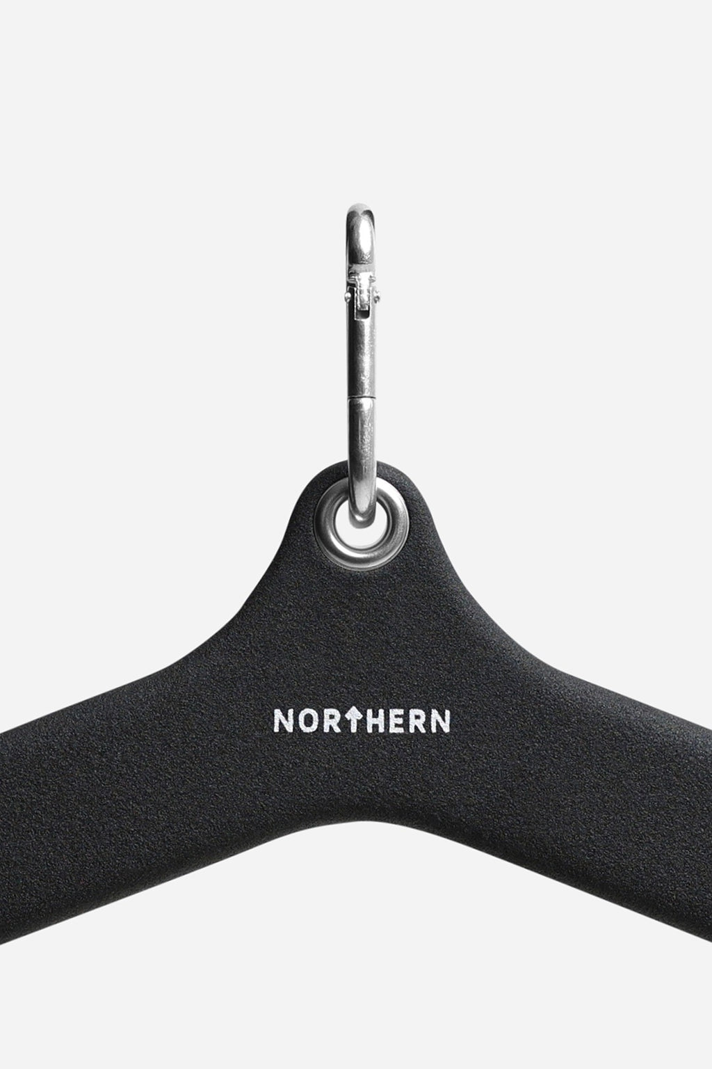 Close-up of wide grip lat pulldown bar connection point with steel eyelet and snap hook